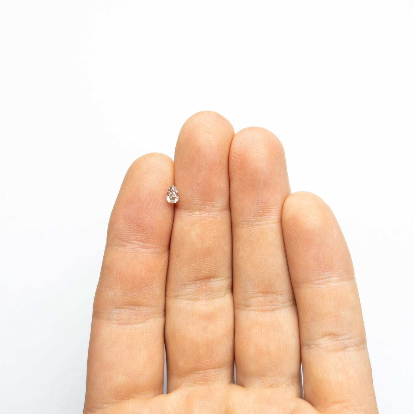 0.34ct 5.35x3.56x2.35mm I1 ファンシー ピンクブラウン ペア ブリリアント 24119-01