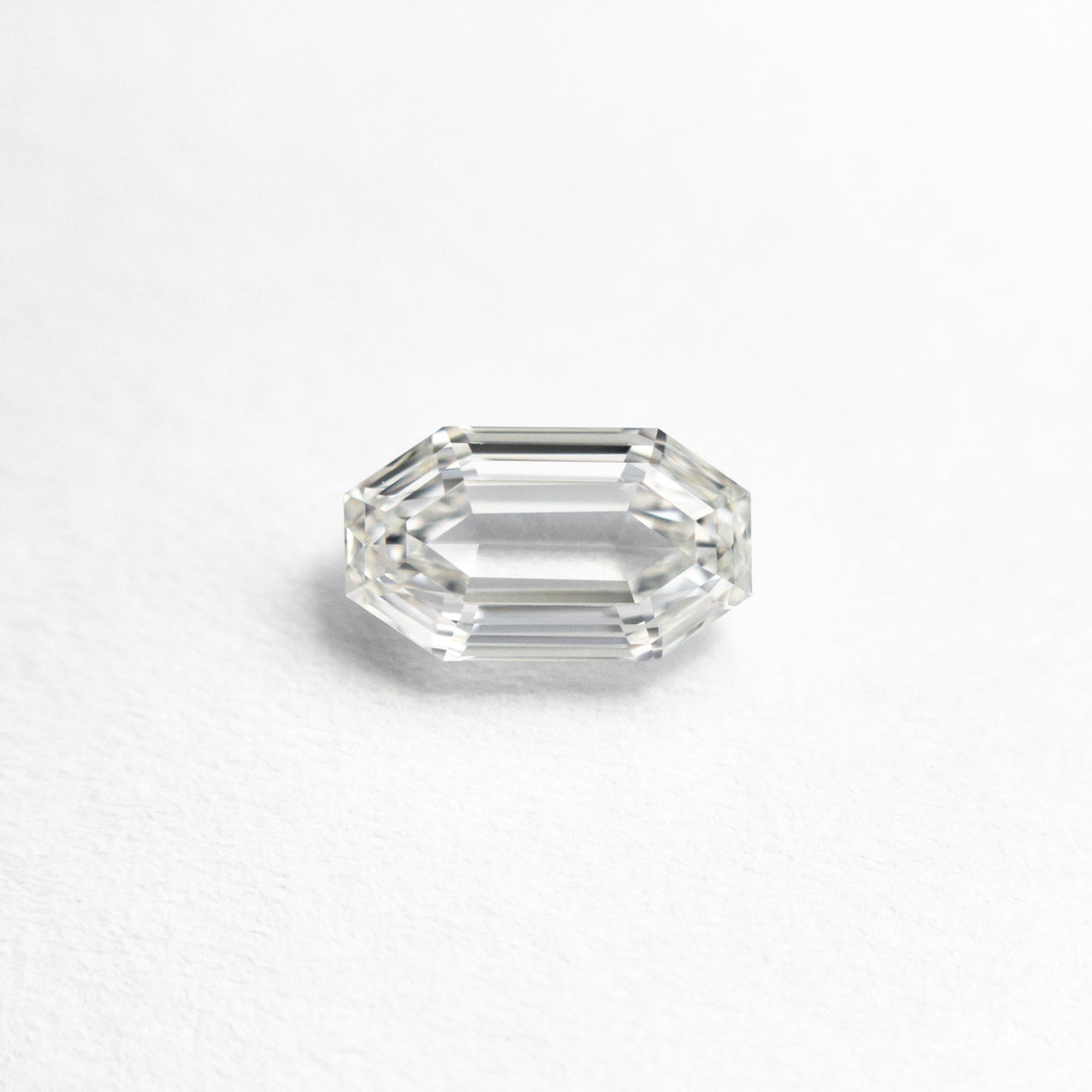 0.60ct 6.34x3.64x2.56mm SI1 H カット コーナー レクタングル ステップカット 19438-41