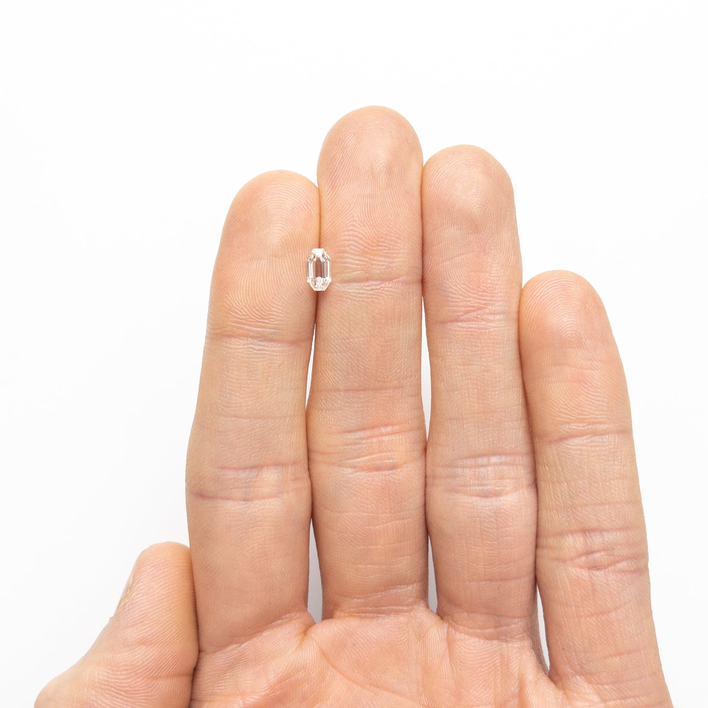 0.60ct 6.34x3.64x2.56mm SI1 H カット コーナー レクタングル ステップカット 19438-41