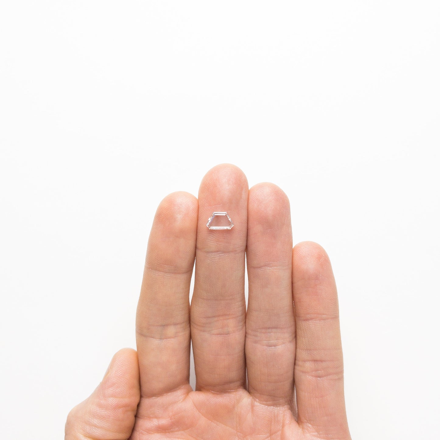 0.90ct 5.52x9.06x1.62mm VS2/SI1 E 幾何学的なポートレート カット 19854-19