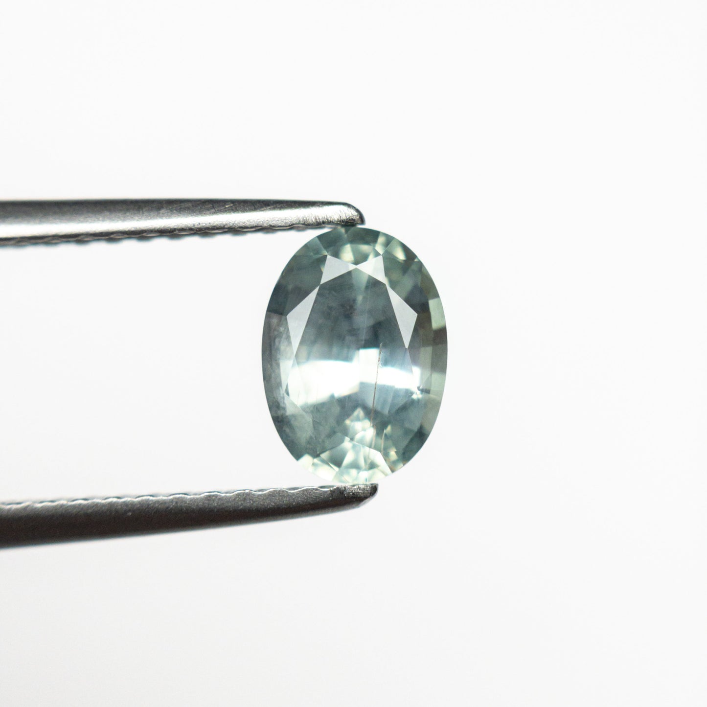 0.93ct 6.85x4.94x3.41mm オーバル ブリリアント サファイア 23426-31