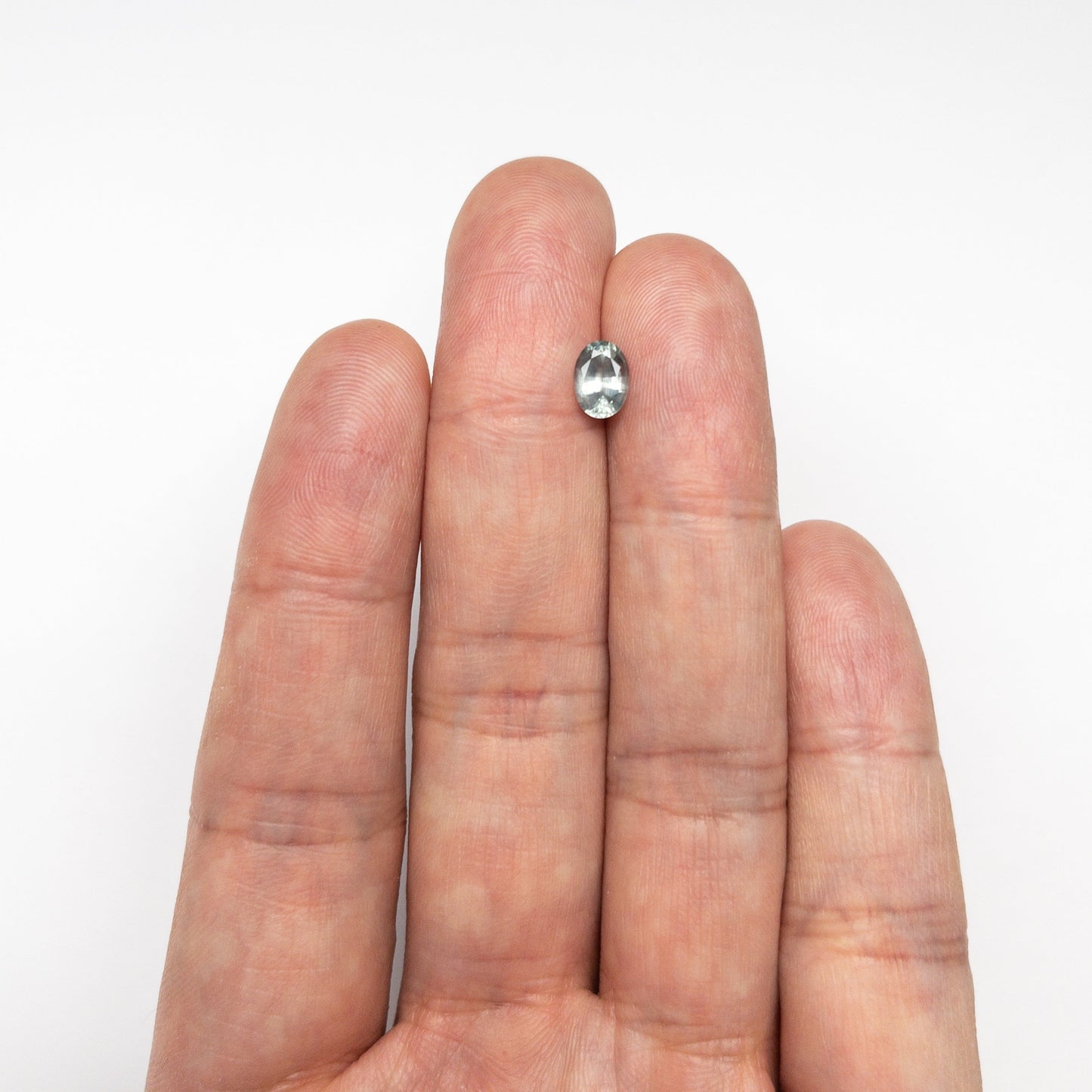 0.93ct 6.85x4.94x3.41mm オーバル ブリリアント サファイア 23426-31