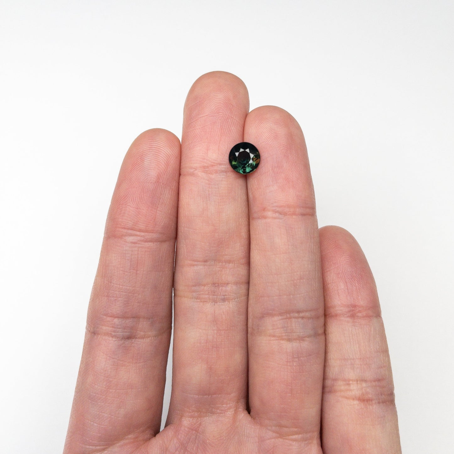 1.37ct 7.15x7.05x3.60mm ラウンドブリリアントサファイア 23806-16