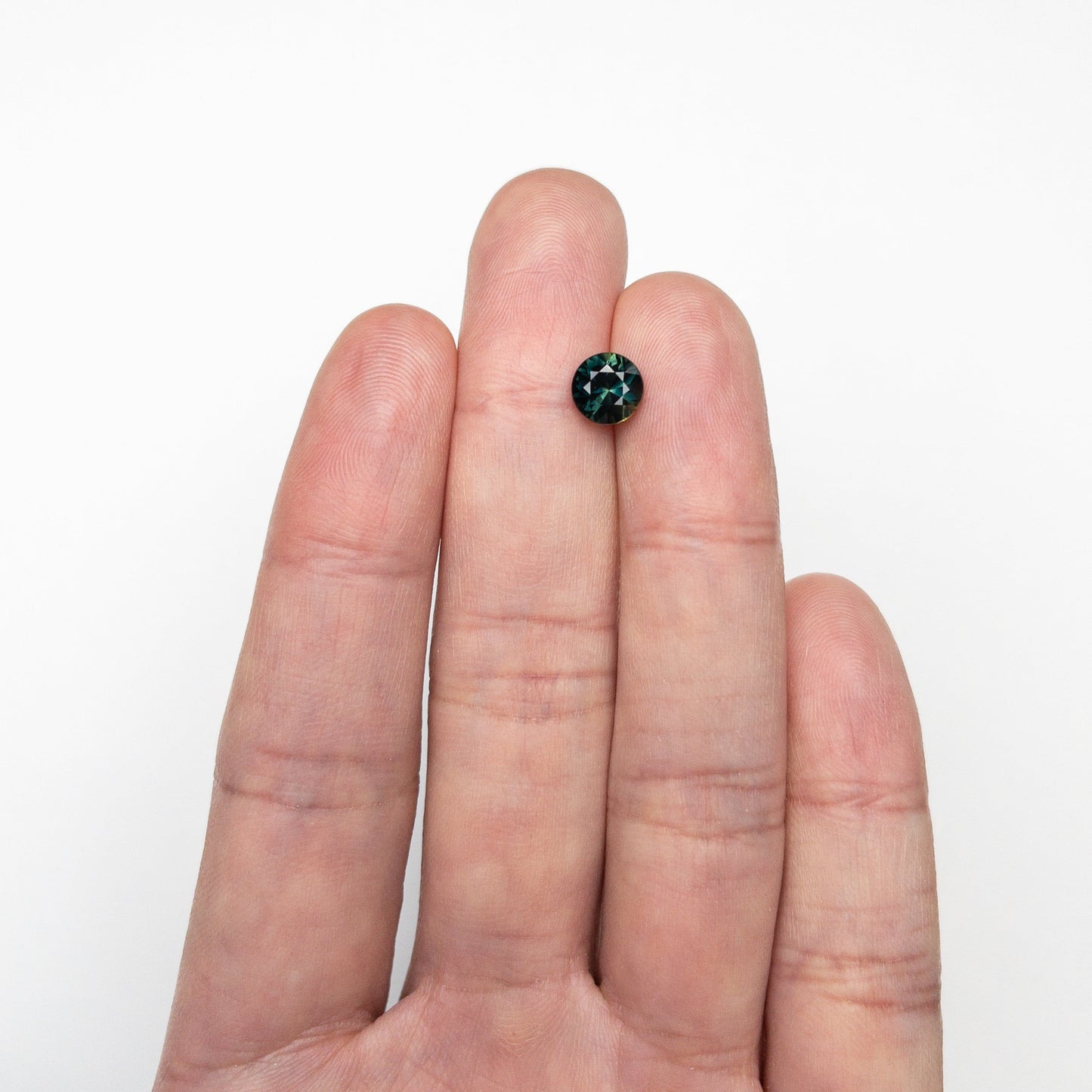 1.49ct 6.77x6.70x4.53mm ラウンドブリリアントサファイア 23806-18