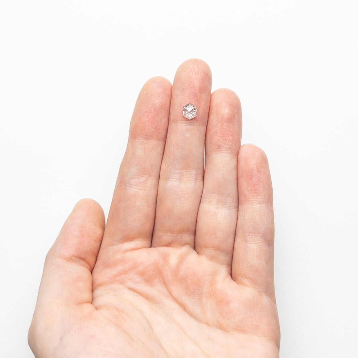 0.64ct 6.25x5.17x2.77mm ヘキサゴン ステップカット 23840-36