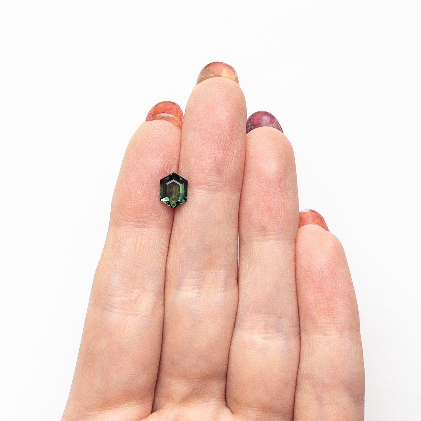 1.52ct 7.69x5.93x3.81mm ヘキサゴンステップカットサファイア 25381-02