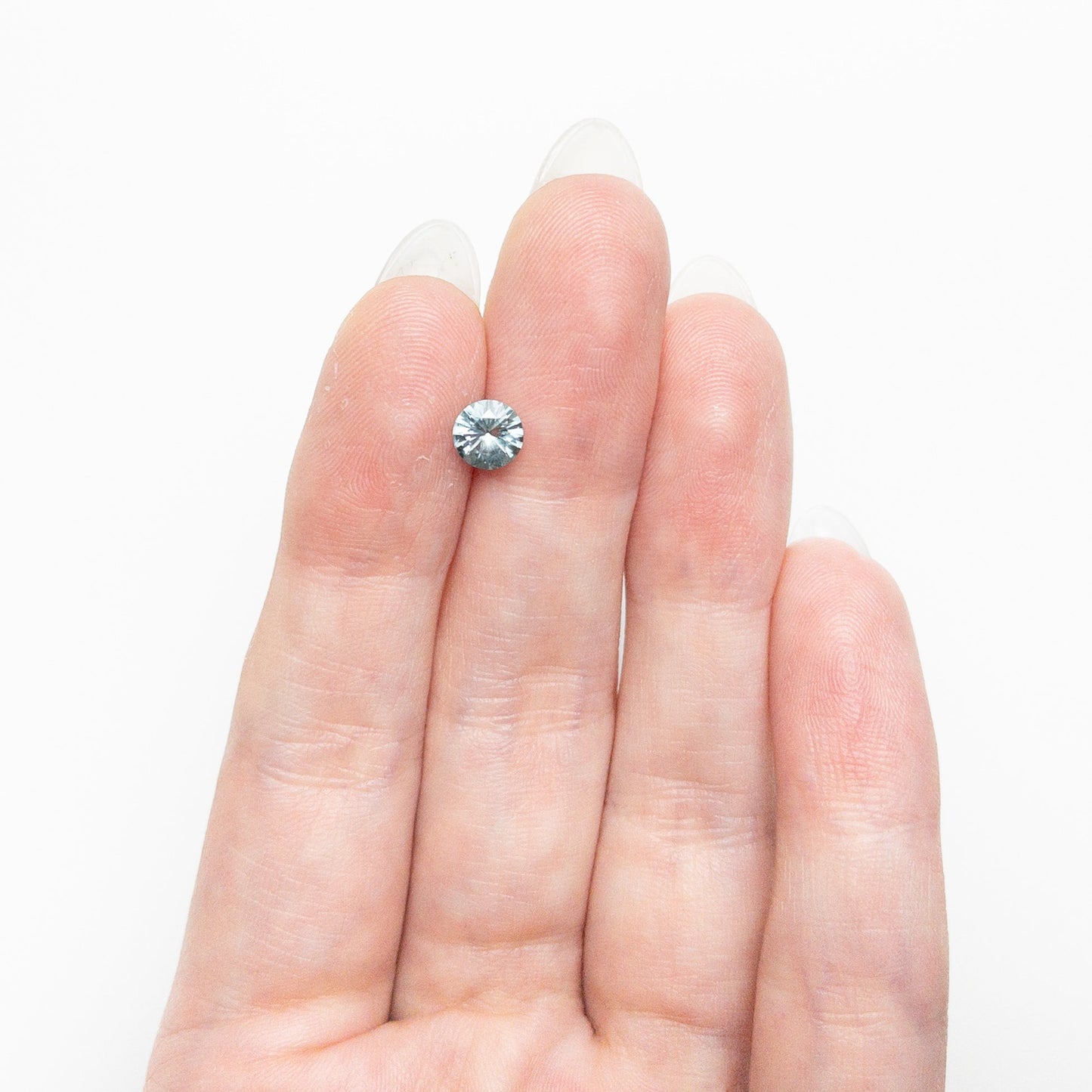 0.67ct 5.43x5.40x3.27mm ラウンドブリリアントサファイア 25400-01