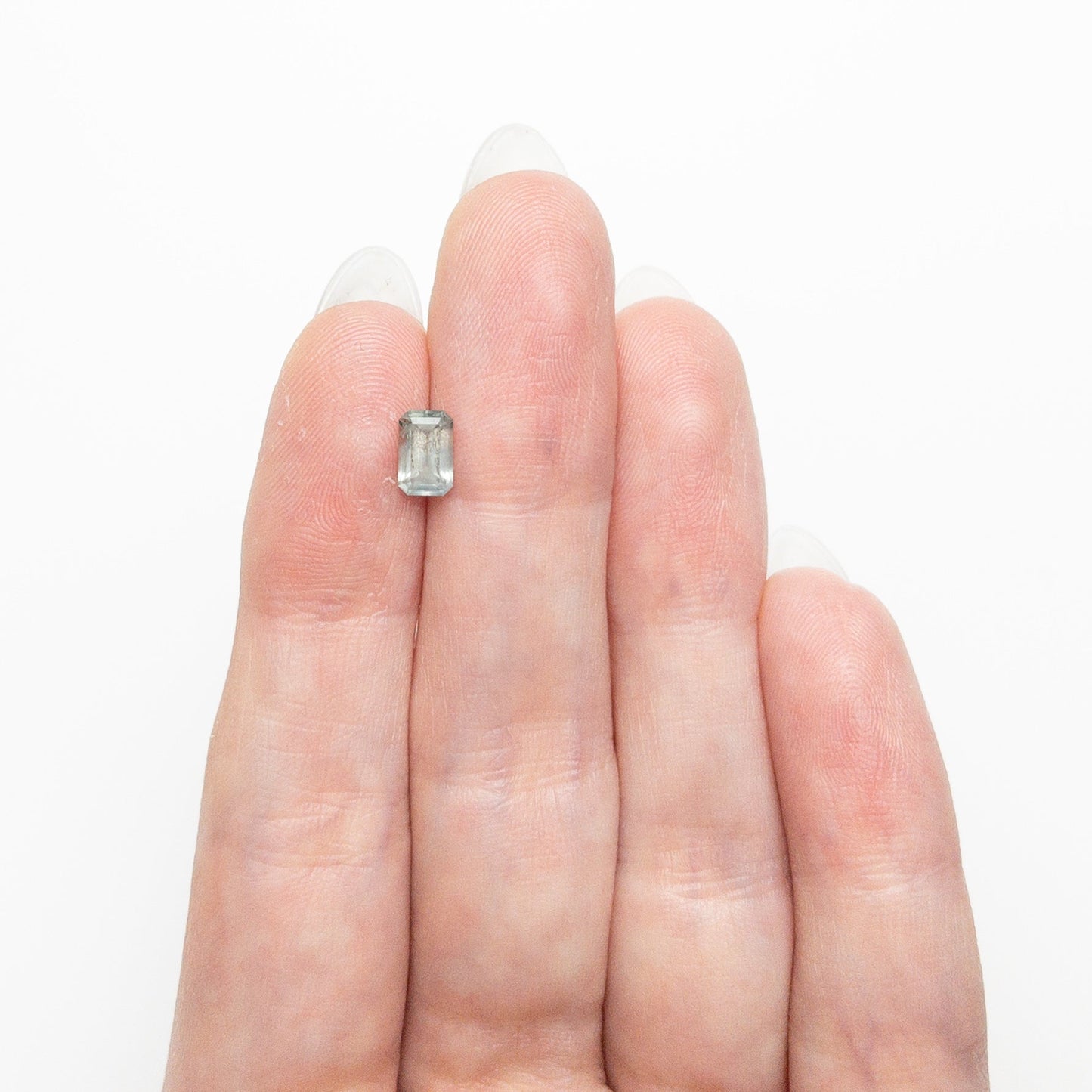 0.76ct 6.26x4.01x2.85mm コーナーカット 長方形 ステップカット サファイア 25427-01