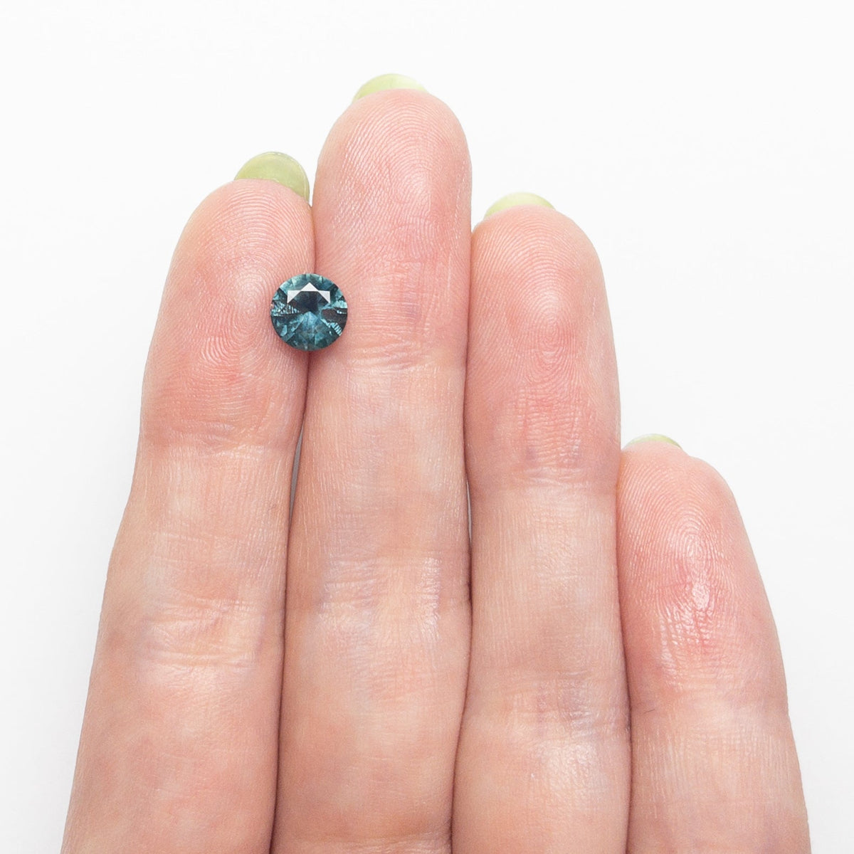 1.17カラット 6.54x6.52x3.85mm ラウンドブリリアントサファイア 26524-02