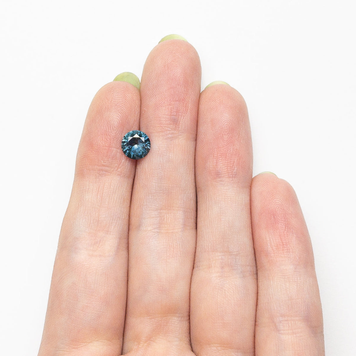 1.25カラット 6.69x6.65x3.88mm ラウンドブリリアント サファイア 26524-11