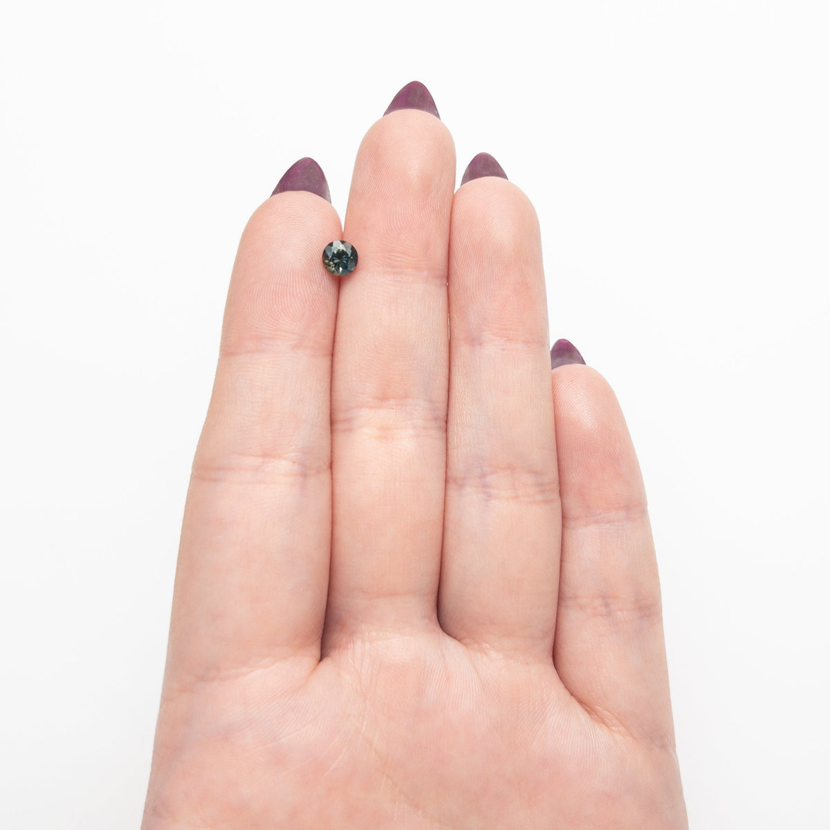 0.70ct 5.16x5.10x3.61mm ラウンドブリリアントサファイア 26526-08