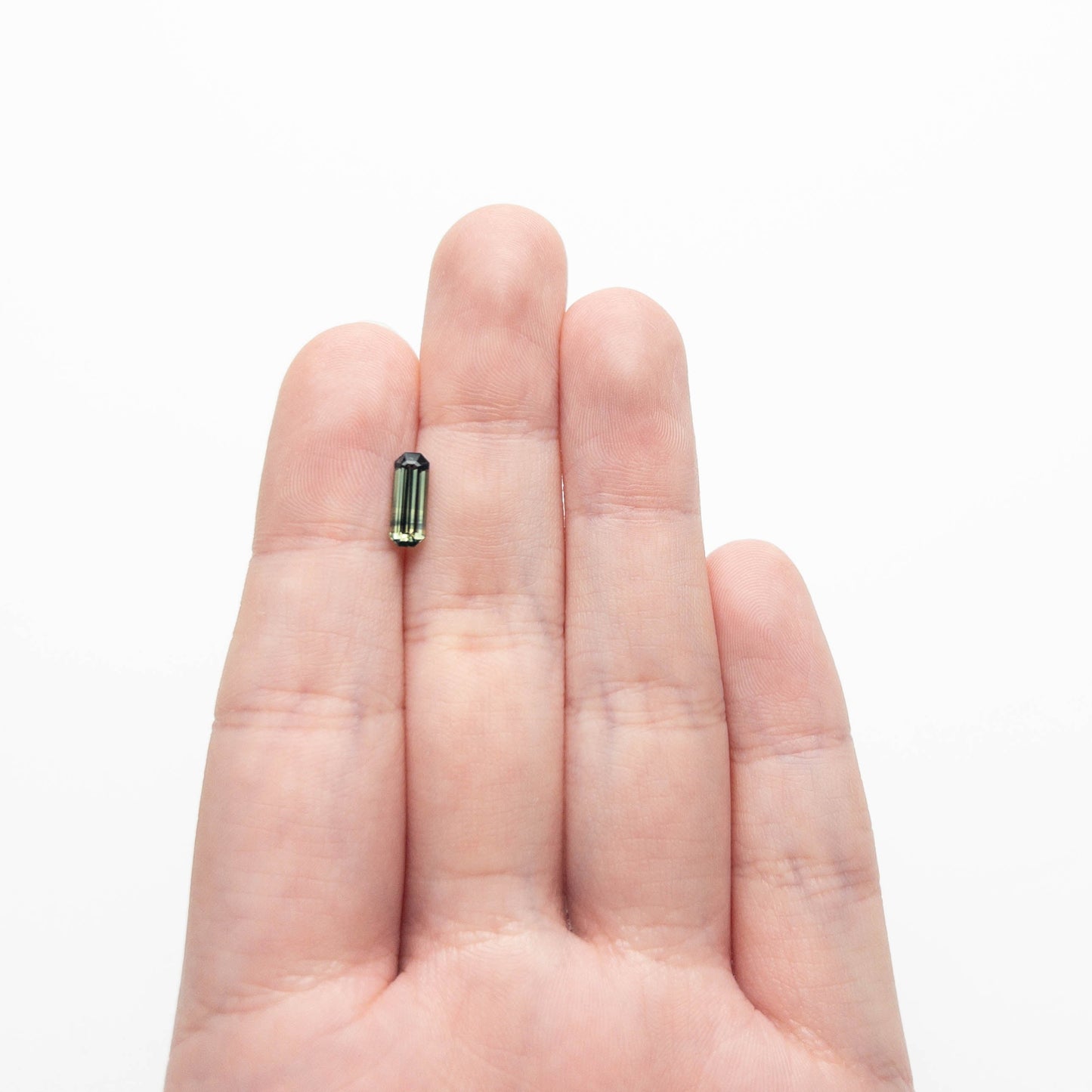 1.29ct 9.973.62x3.19mm カットコーナーステップカットサファイア 27329-03