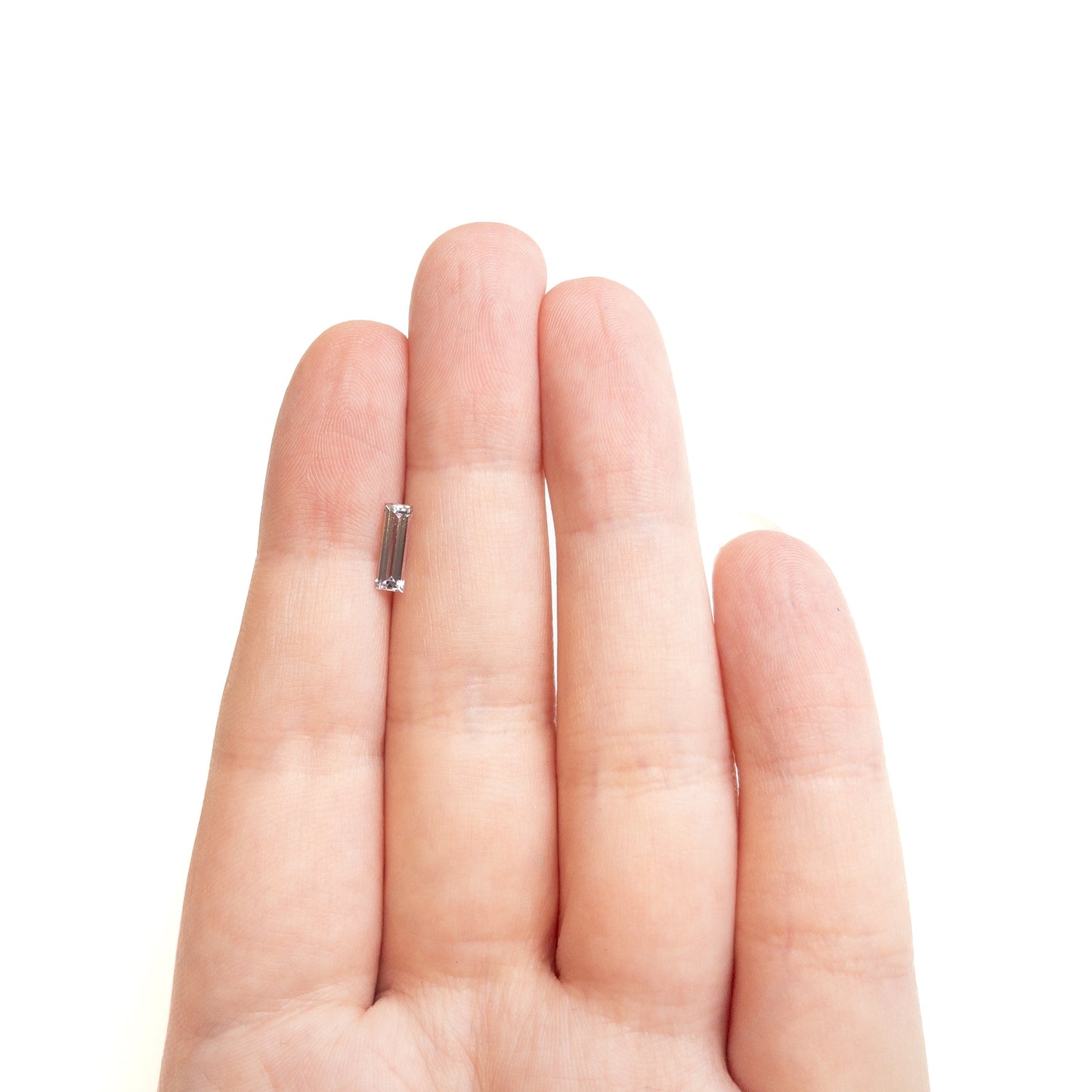 0.63ct 8.99x3.02x2.04mm バゲットステップカットサファイア 27720-02