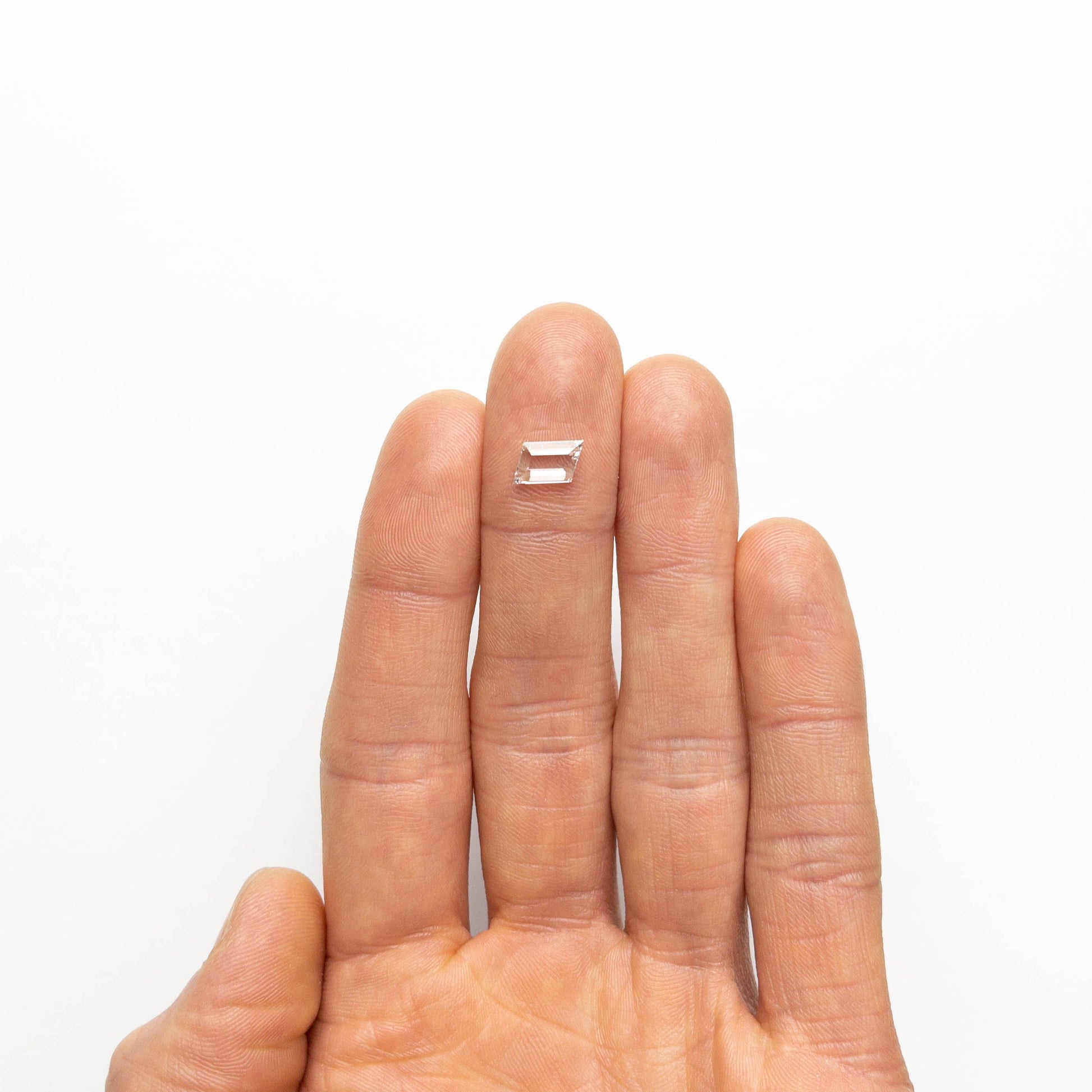 1.07ct 10.32x5.04x2.18mm 幾何学的なポートレート カット 18069-03
