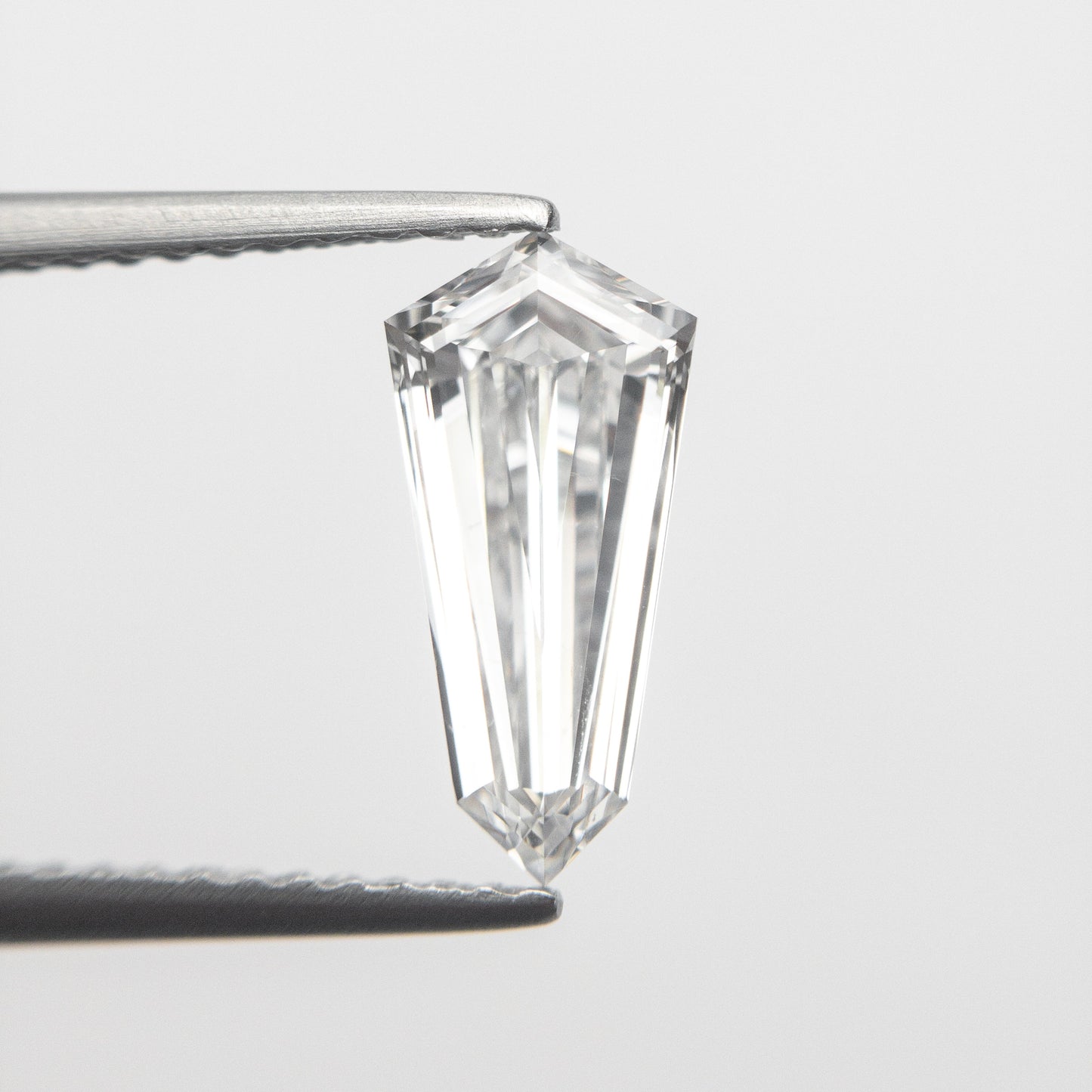 1.10ct 10.99x5.26x2.90mm GIA SI1 E カイト ステップ カット 19488-01