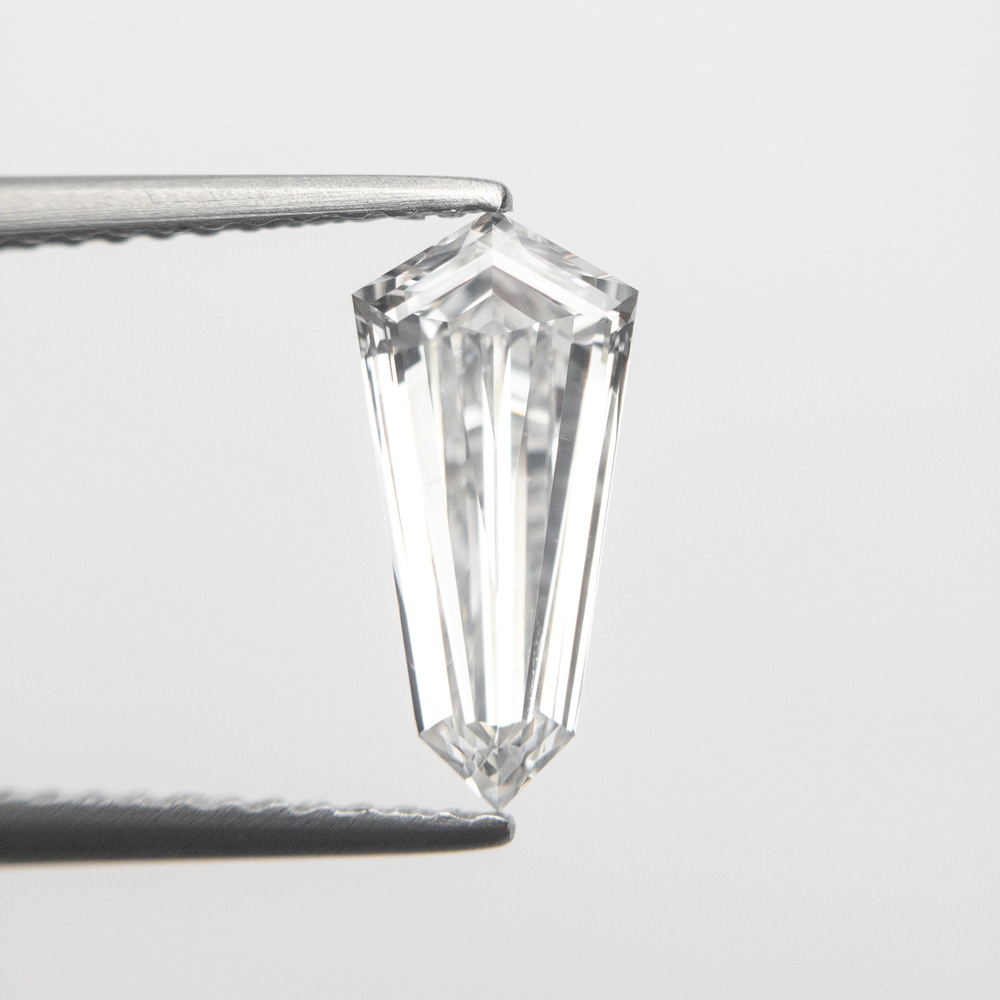 1.10ct 10.99x5.26x2.90mm GIA SI1 E カイト ステップ カット 19488-01