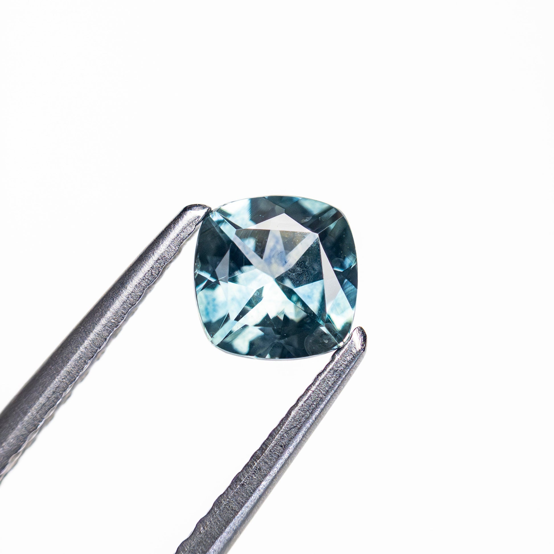 0.68ct 5.06x4.99x3.05mm Cushion Brilliant Sapphire 23466-20