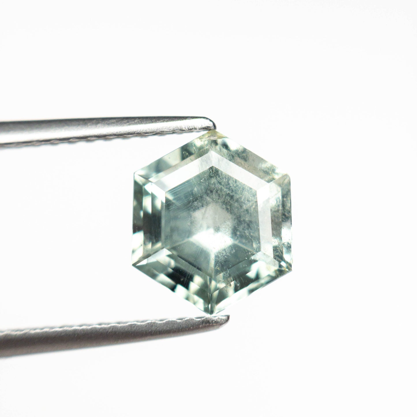 2.32ct 8.56x7.39x5.02mm ヘキサゴン ステップ カット サファイア 23695-04