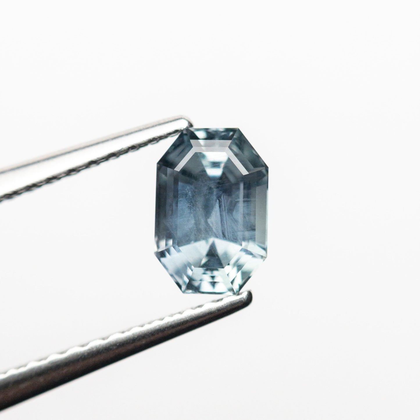 1.12ct 6.59x4.47x3.85mm カット コーナー レクタングル ステップ カット サファイア 23698-04