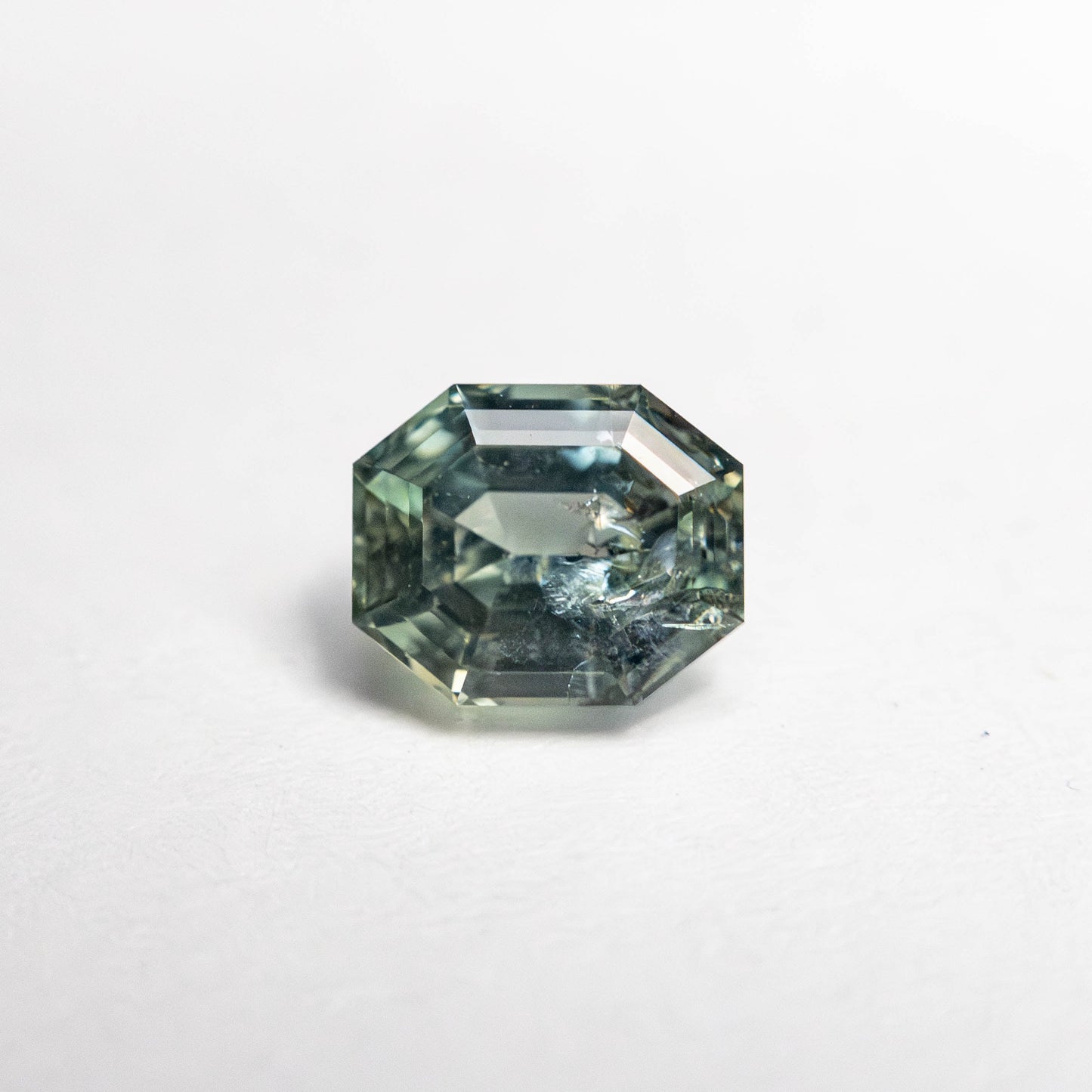 0.91ct 5.66x4.68x3.54mm カット コーナー レクタングル ステップ カット サファイア 23705-15