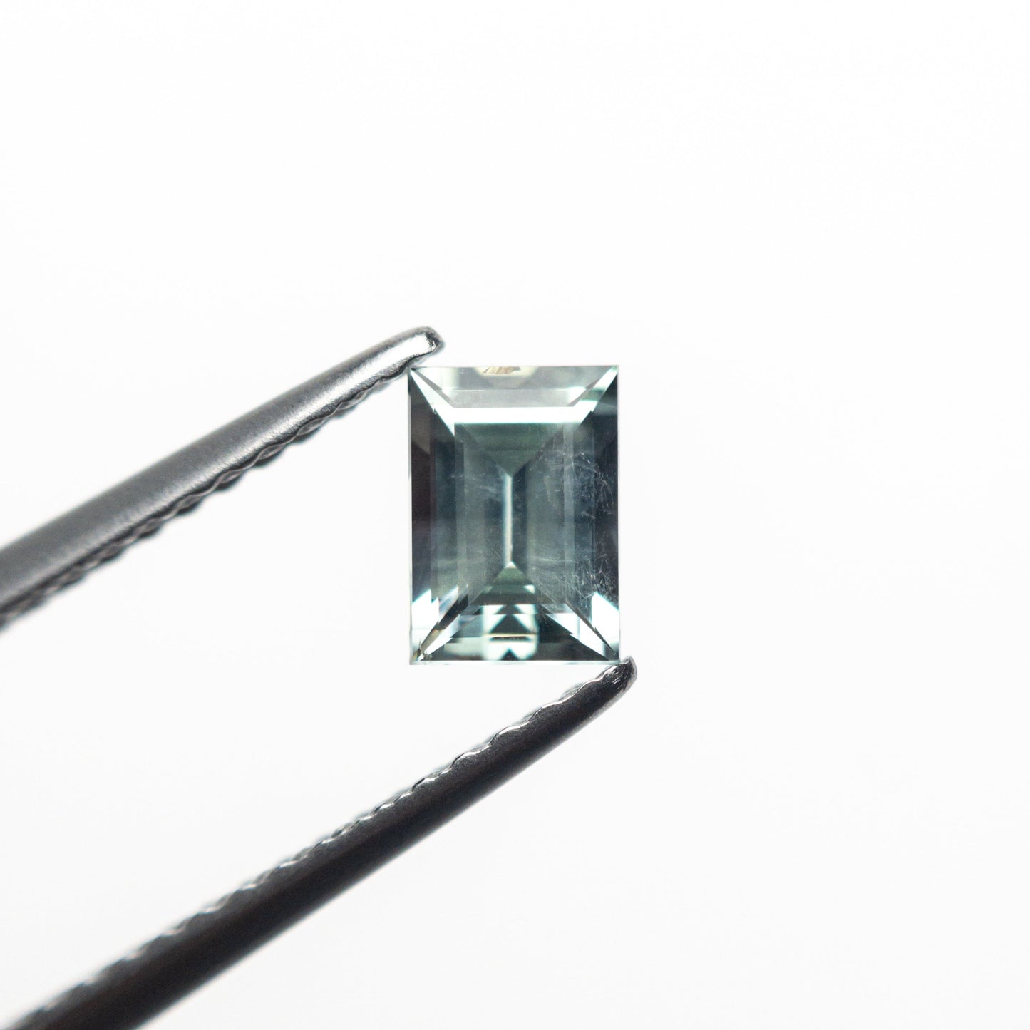 0.54ct 5.40x3.82x2.65mm 長方形ステップカットサファイア 23715-09