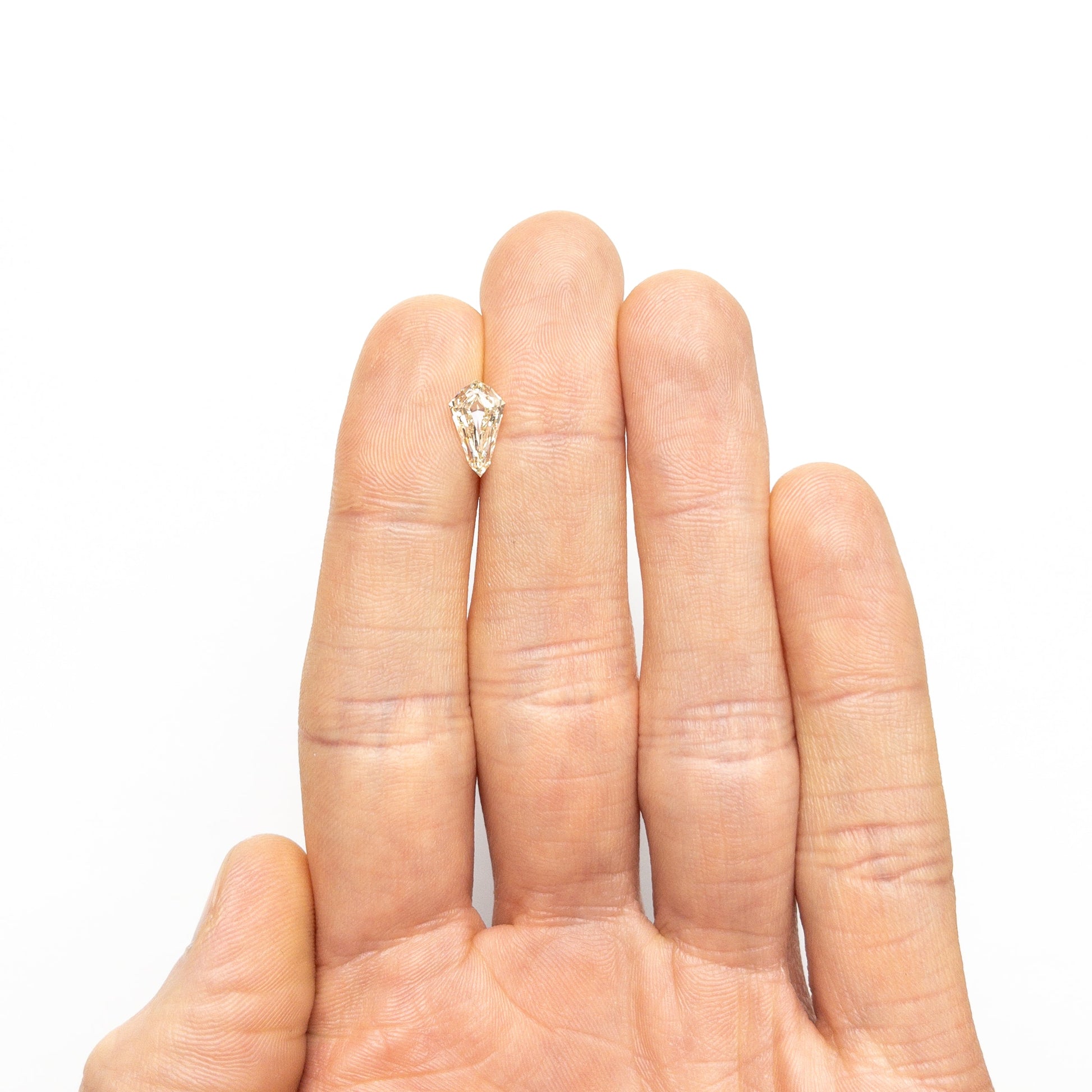 1.56ct 10.87x6.23x3.66mm VVS2 OP シールド ステップカット 25958-01