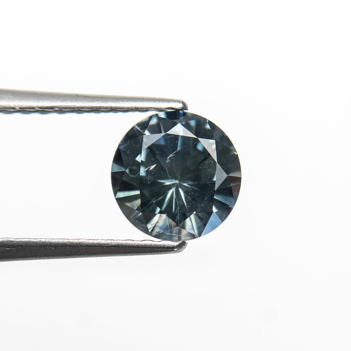 1.04ct 6.10x6.07x3.89mm ラウンドブリリアントサファイア 26141-25