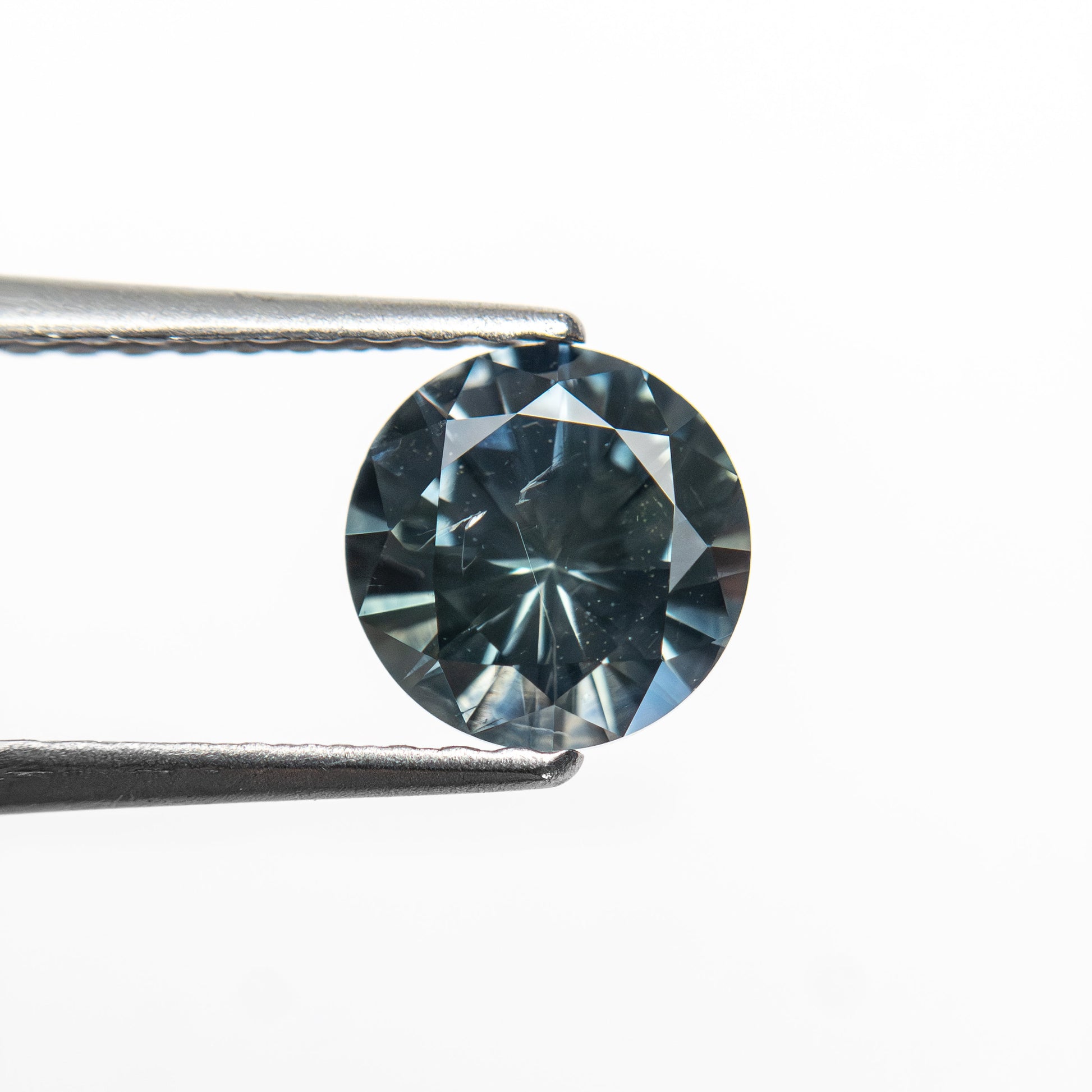1.04ct 6.10x6.07x3.89mm ラウンドブリリアントサファイア 26141-25