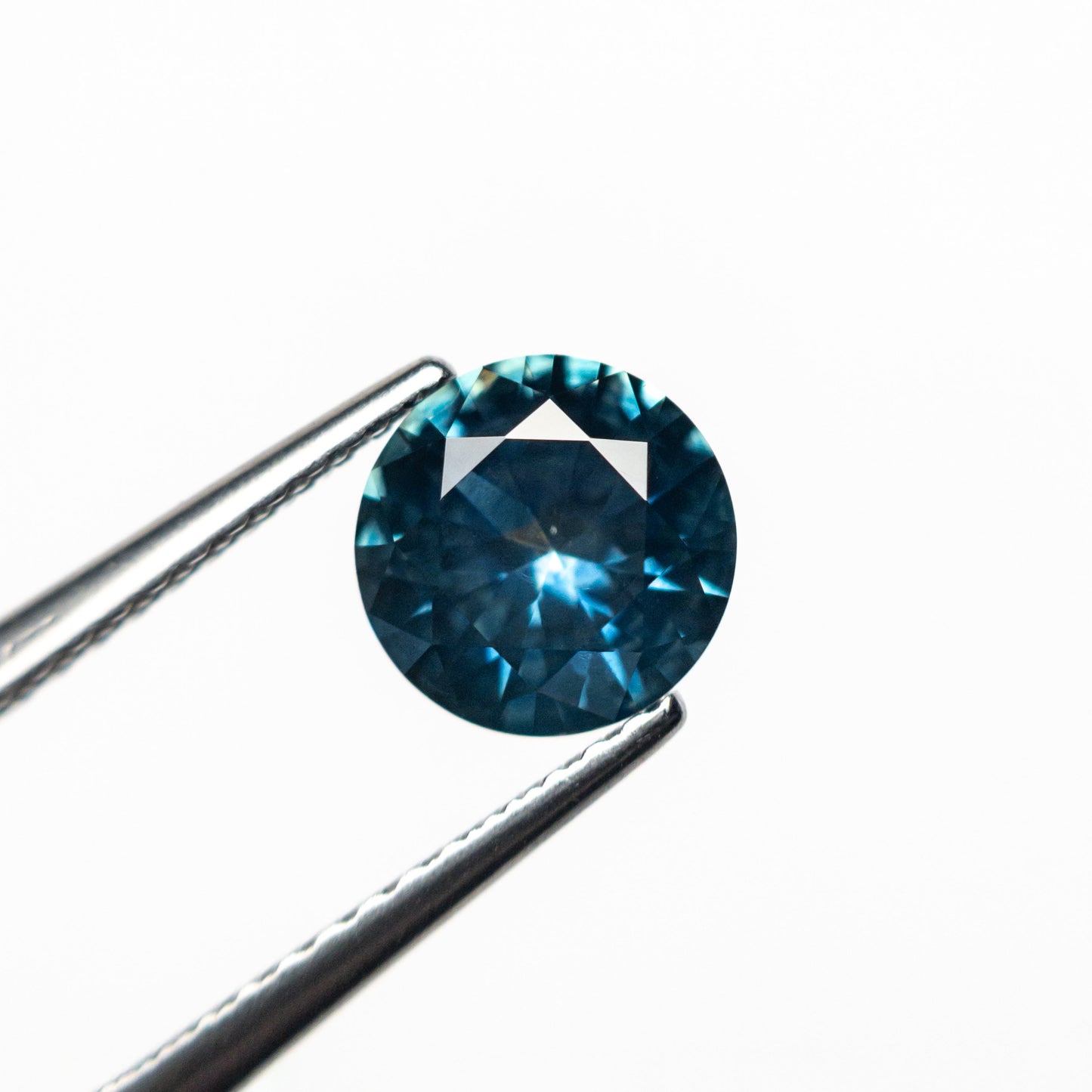 1.25カラット 6.69x6.65x3.88mm ラウンドブリリアントサファイア 26524-11