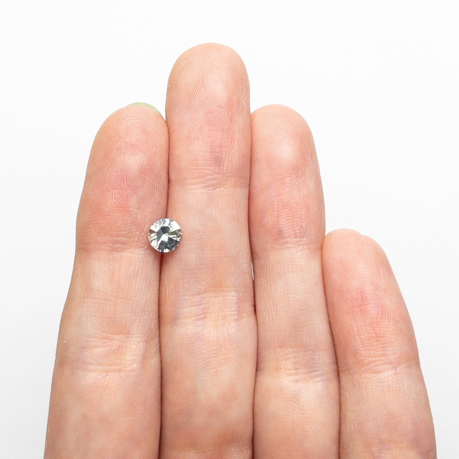 0.66カラット 5.20x5.17x3.33mm ラウンドブリリアントサファイア 26556-12