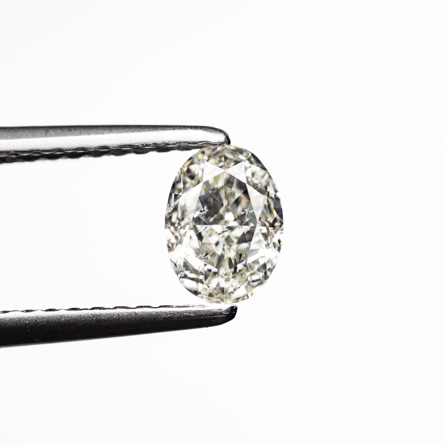0.70ct 6.09x4.50x3.04mm SI2 K Oval Brilliant 27065-05