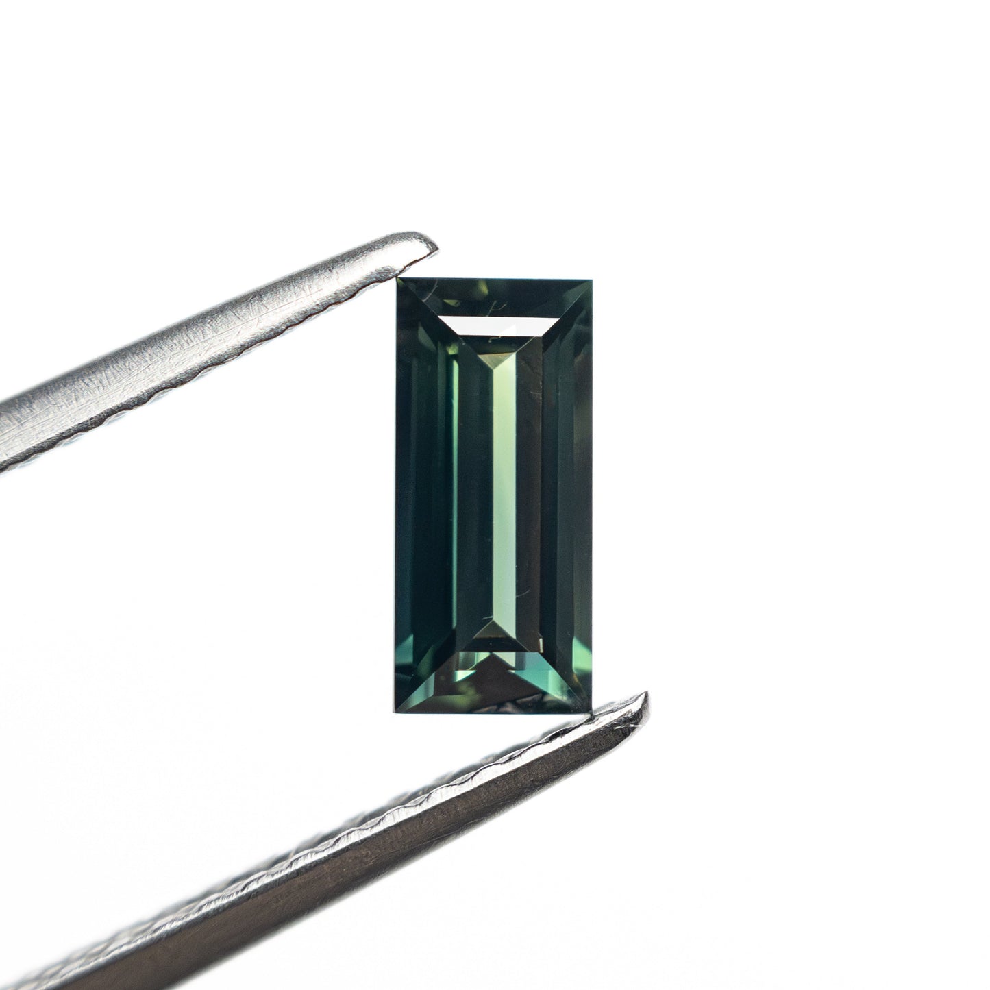 0.71ct 7.14x3.43x2.45mm レクタングルステップカットサファイア 27336-46