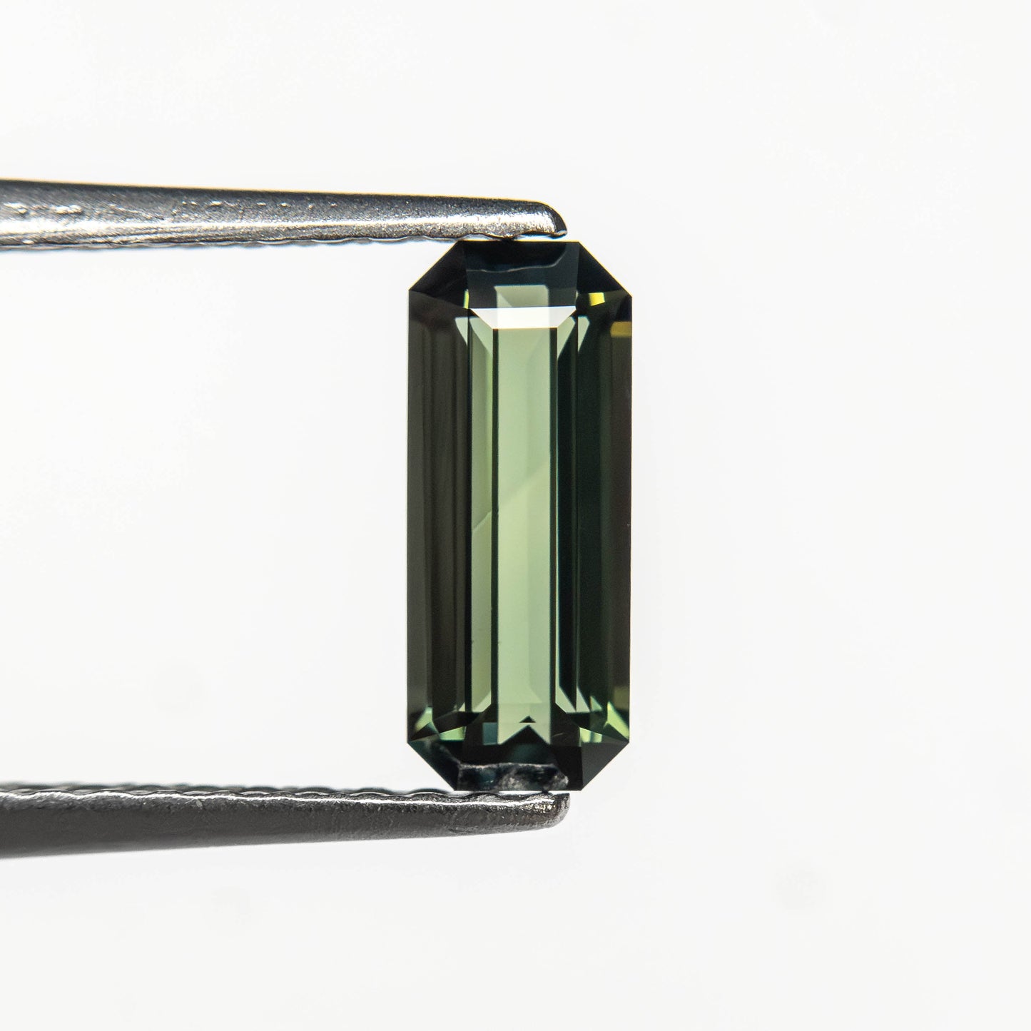 0.77ct 8.35x3.41x2.50mm Cut Corner Rectangle Step Cut Sapphire 27336-58