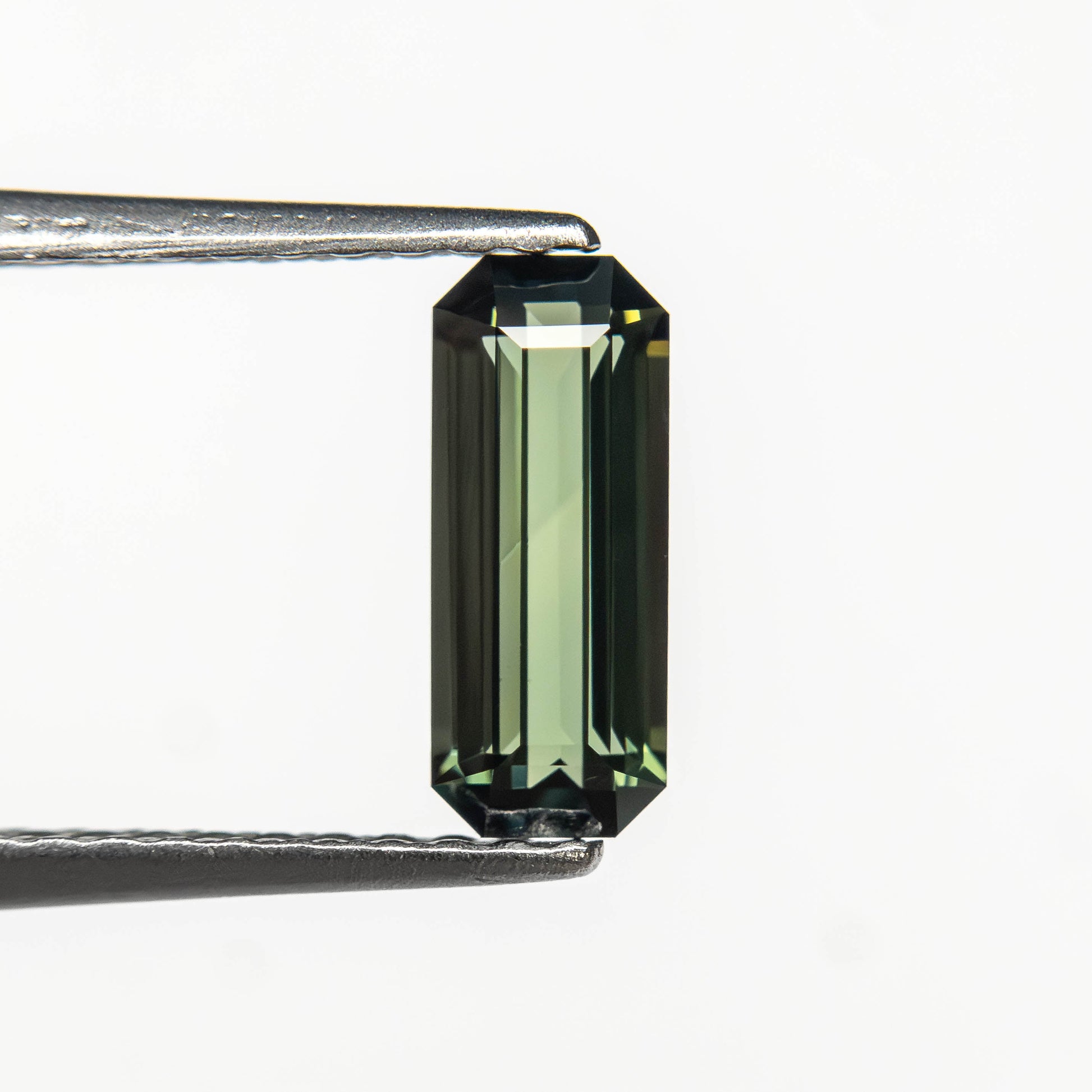 0.77ct 8.35x3.41x2.50mm Cut Corner Rectangle Step Cut Sapphire 27336-58