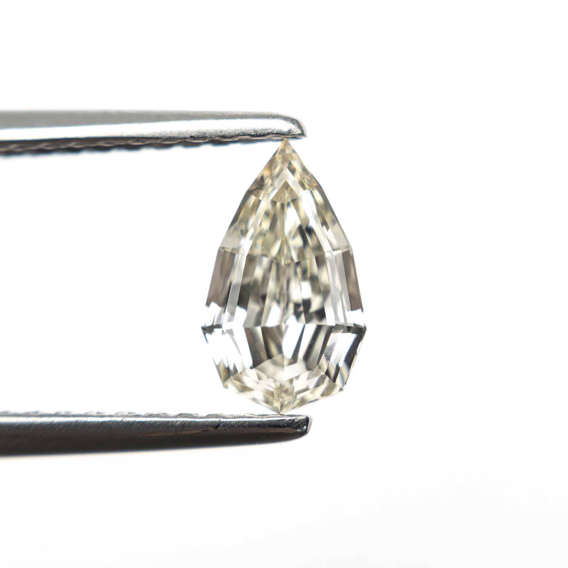0.71ct 7.85x4.68x2.90mm VVS2 Q-R Geo Pear Step Cut 🇿🇦 27364-15