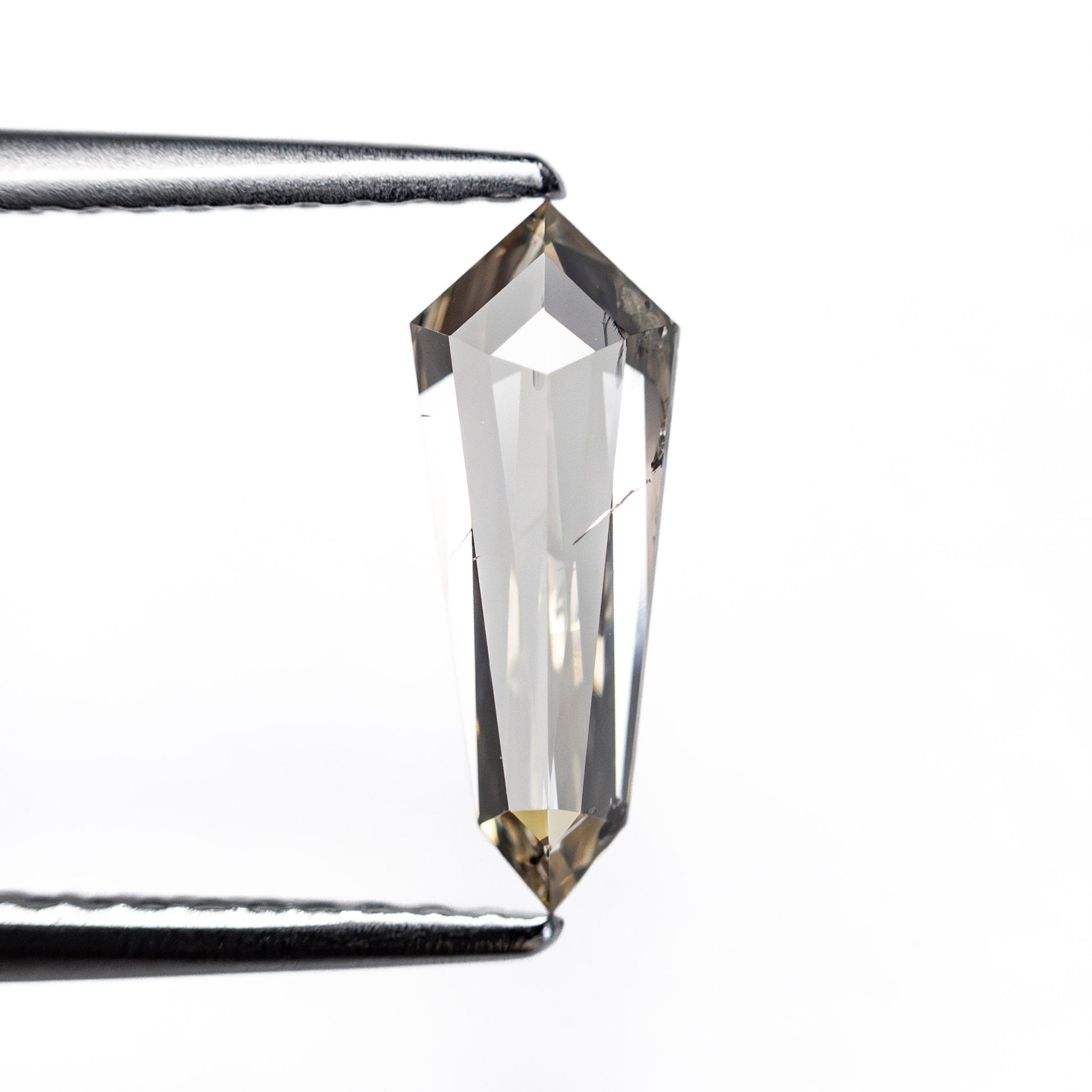 0.83ct 10.96x4.15x2.50mm Shield Step Cut 27537-35