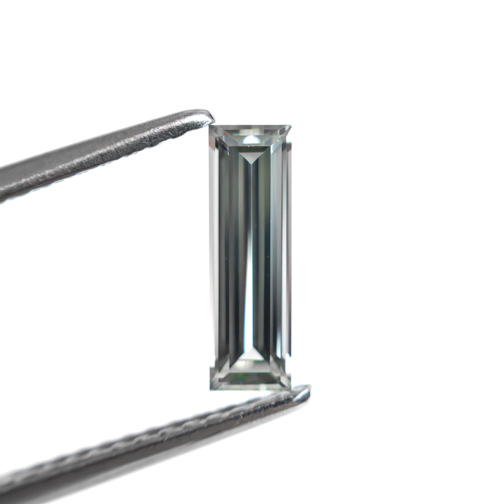 0.59ct 9.05x2.80x2.00mm バゲットステップカットサファイア 27720-03