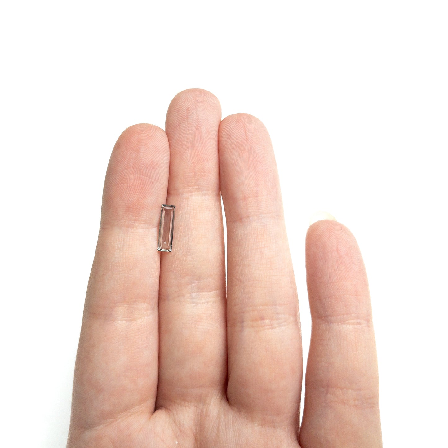 0.81ct 11.41x3.48x1.63mm バゲットステップカットサファイア 27720-05