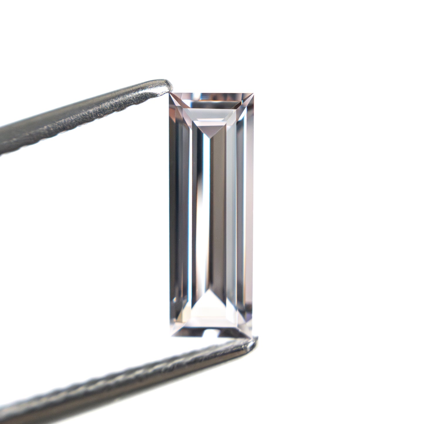 0.91ct 10.30x3.53x2.27mm バゲットステップカットサファイア 27720-06