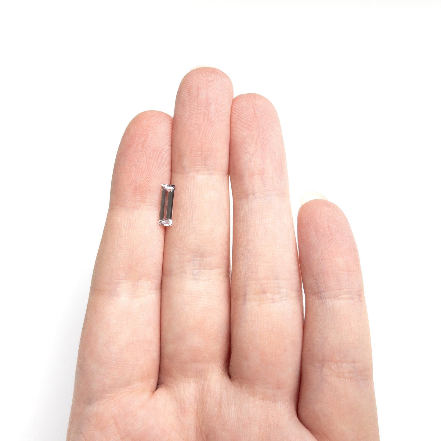 0.91ct 10.30x3.53x2.27mm バゲットステップカットサファイア 27720-06