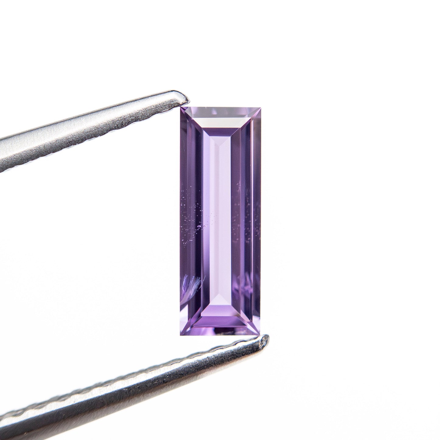 0.53ct 8.54x3.04x1.74mm バゲットステップカットサファイア 27721-09