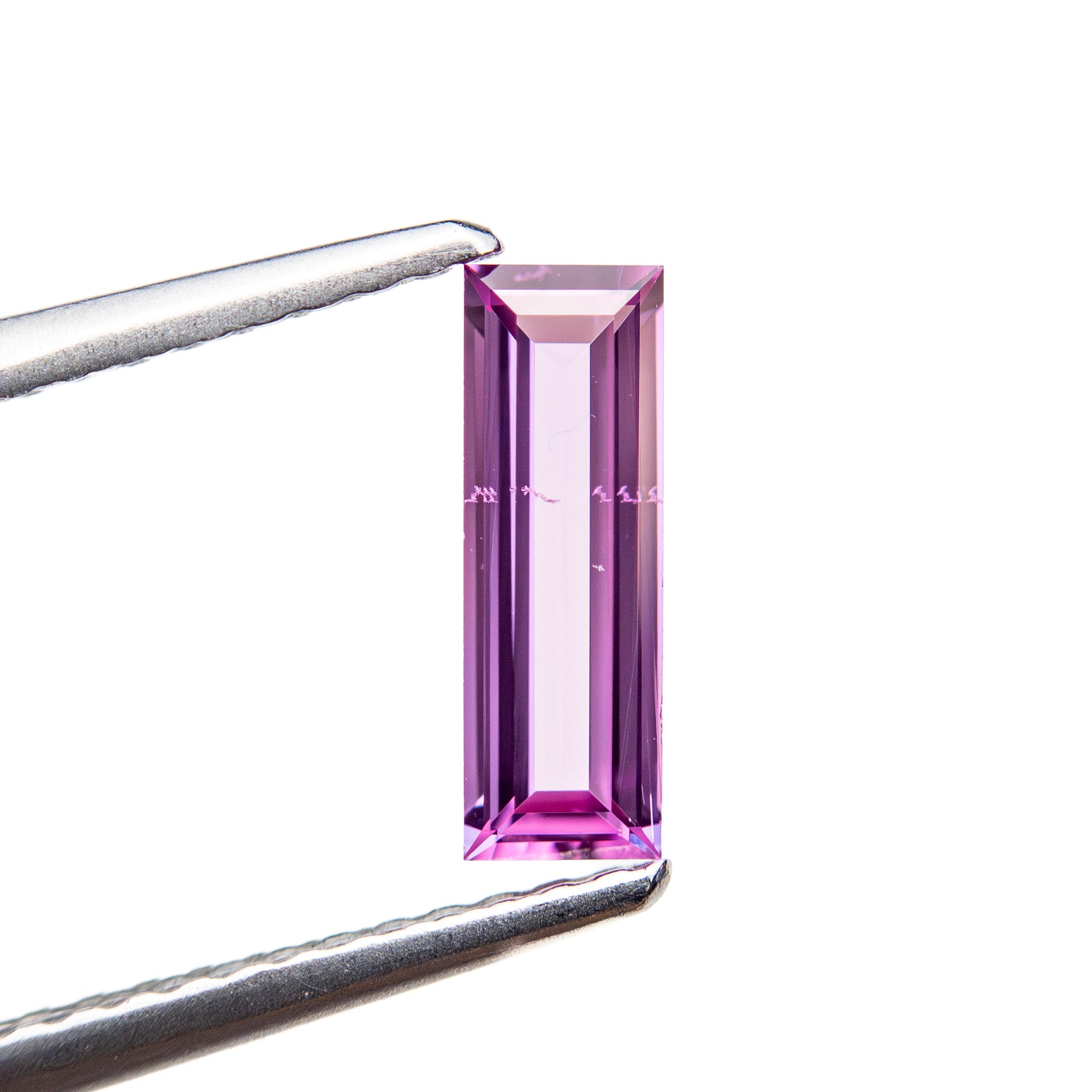 0.56ct 9.04x3.04x1.68mm バゲットステップカットサファイア 27721-11