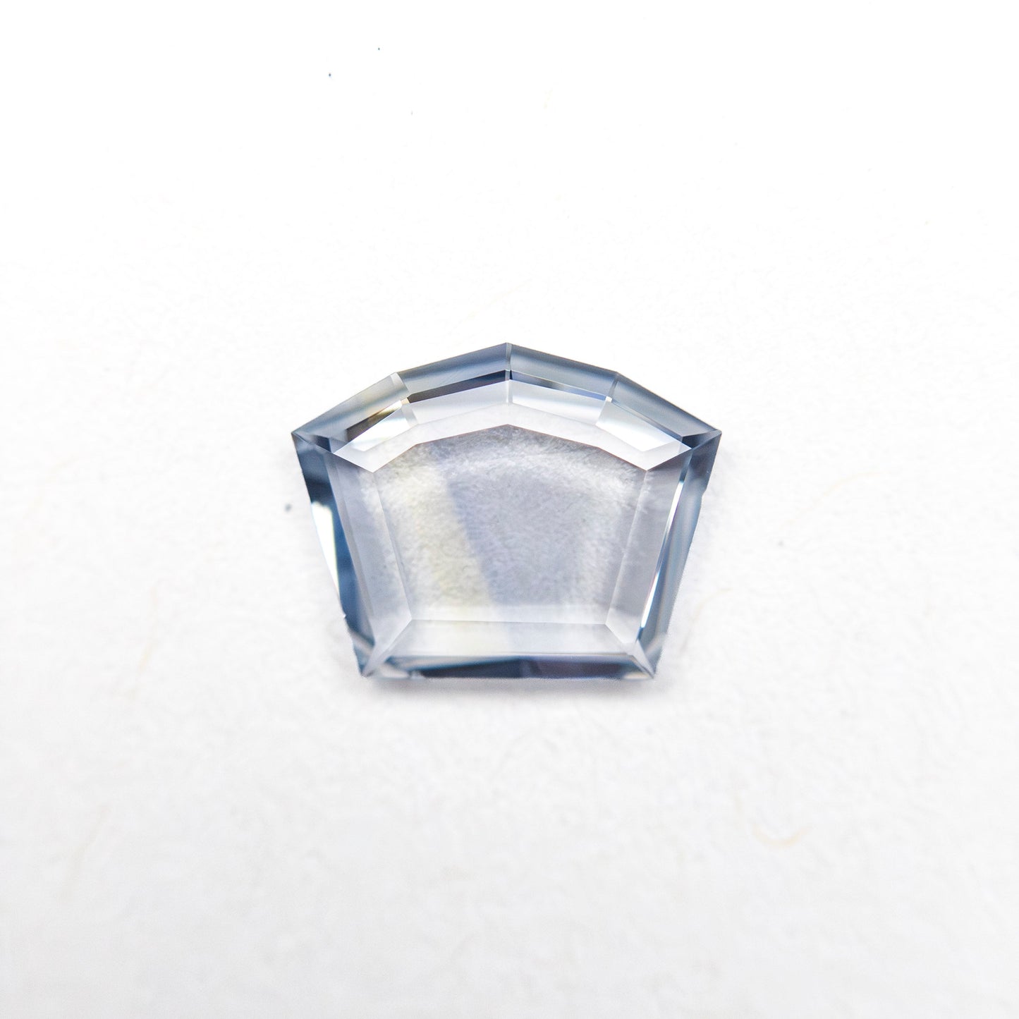 0.59ct 5.61x7.04x1.35mm Shield Portrait Cut Sapphire 27740-13