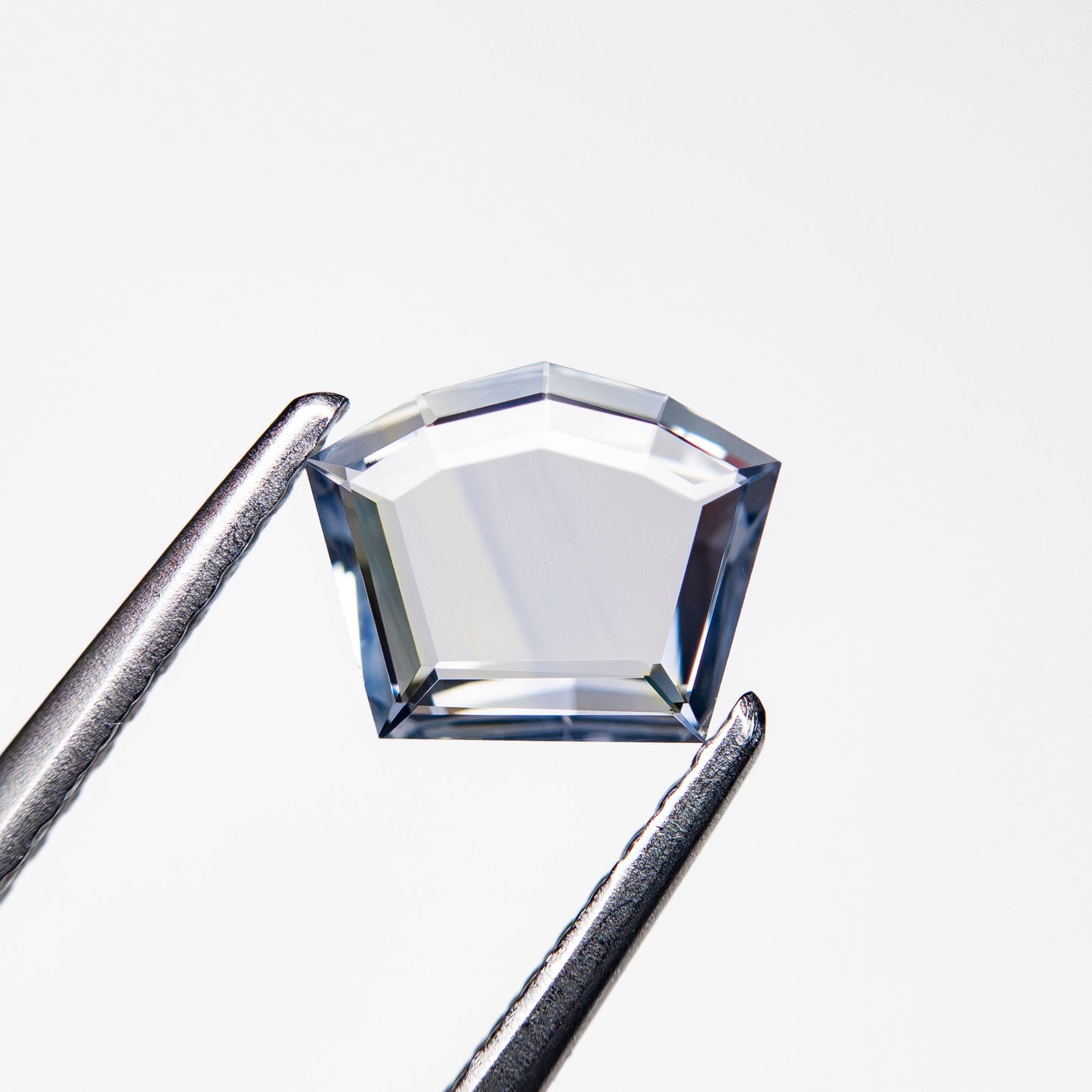 0.59ct 5.61x7.04x1.35mm Shield Portrait Cut Sapphire 27740-13