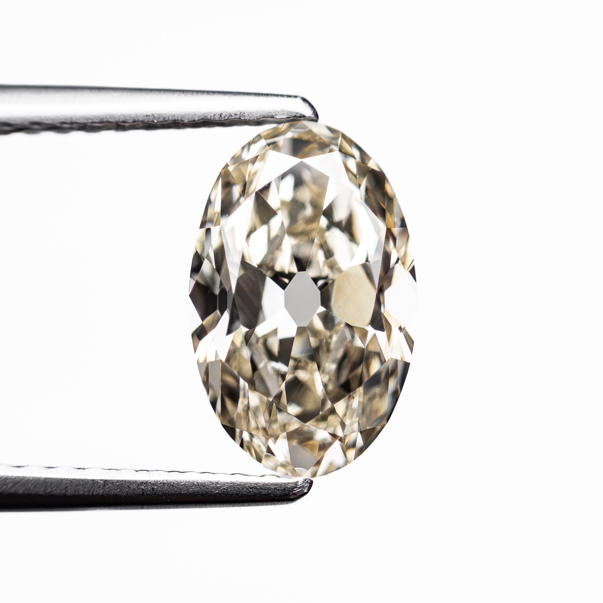 1.66ct 9.84x6.26x3.63mm GIA VS2 M Modern Antique Oval Brilliant 28039-01