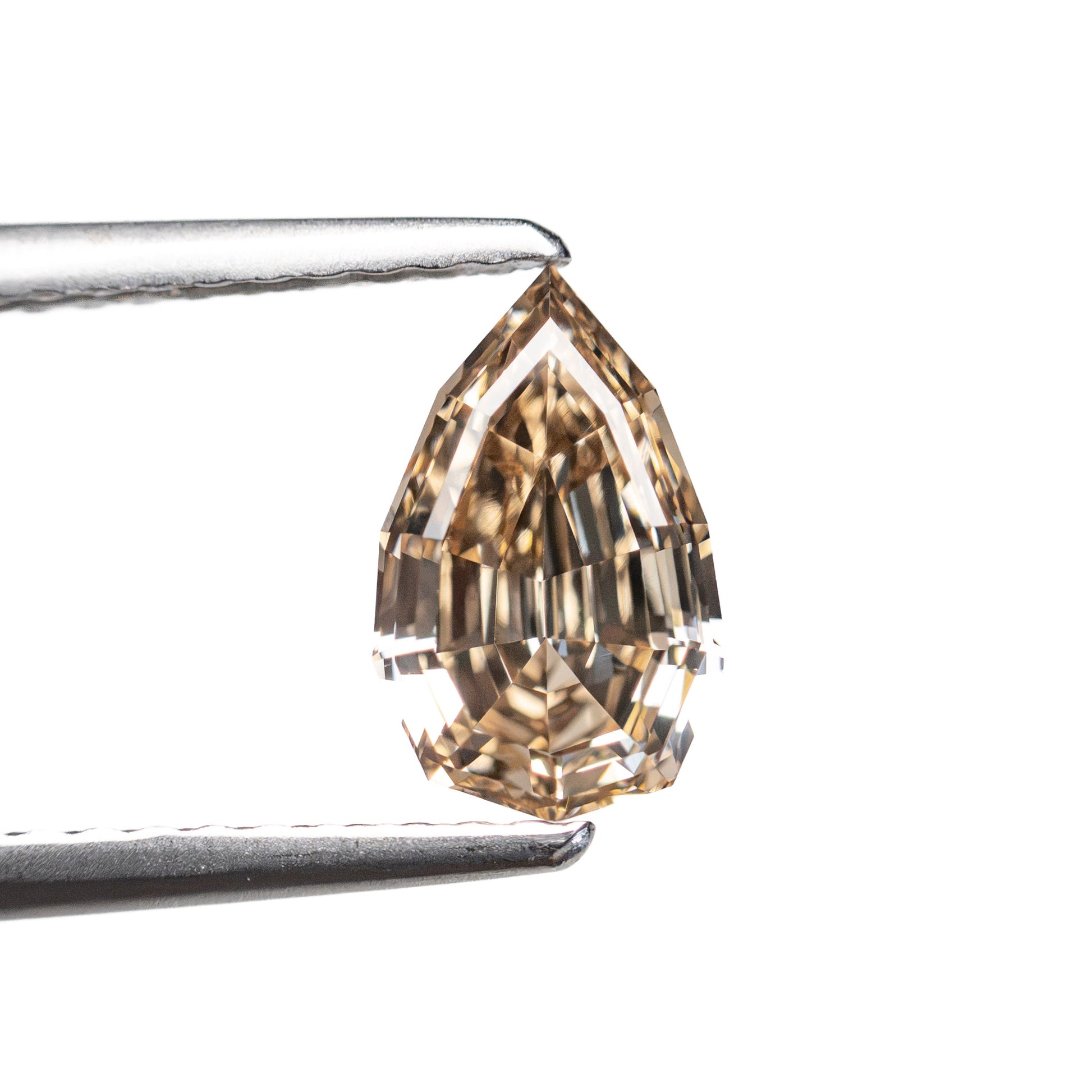 1.07ct 8.54x5.34x3.34 VS2 Fancy Orangey Brown Geo Pear Step Cut 28053-01